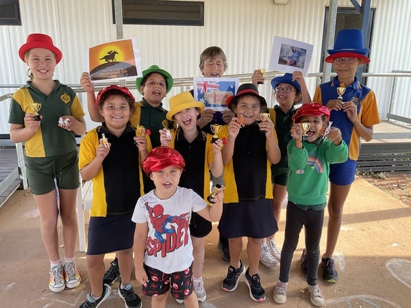 Children dressed up and celebrating Melbourne Cup at Injilinji After School Care