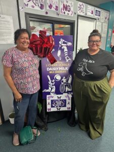 Ladies standing in front of a giant chocolate bar